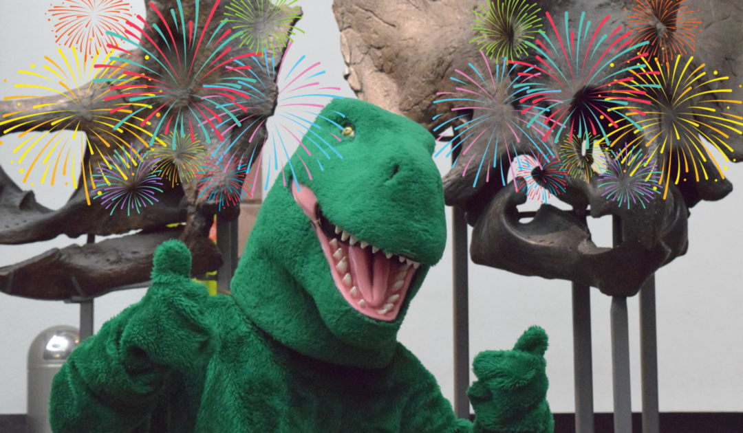 Dinomaskottchen gratuliert